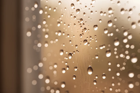 Drops of rain on the window. Abstract background for design.の素材