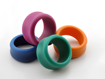 Colorful rings on white background. 3d rendering. Computer digital drawing.の素材
