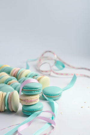 Colorful macaroons on a white background. Selective focus.の素材
