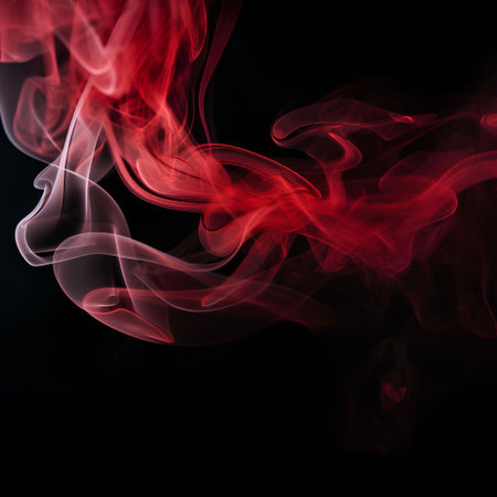 Red smoke on black background. Abstract color smoke on black background.の素材