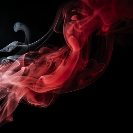 Abstract red smoke on black background with copy space for your text.の素材