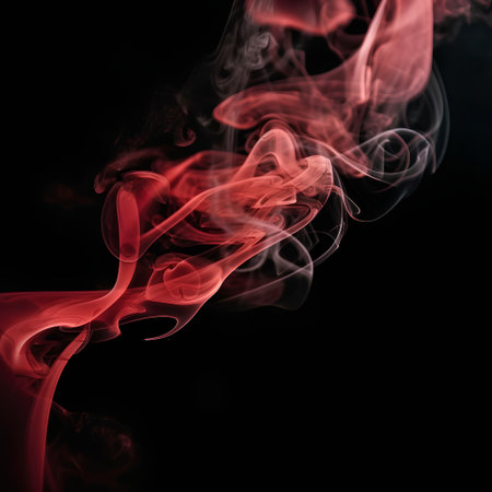 Abstract red smoke on black background, close-up, copy spaceの素材