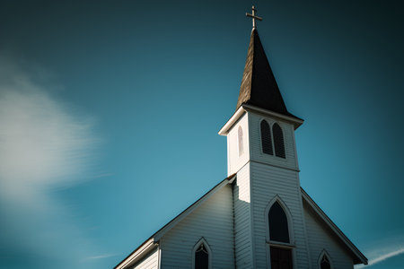 Church steeple against blue sky in Reykjavik, Icelandの素材