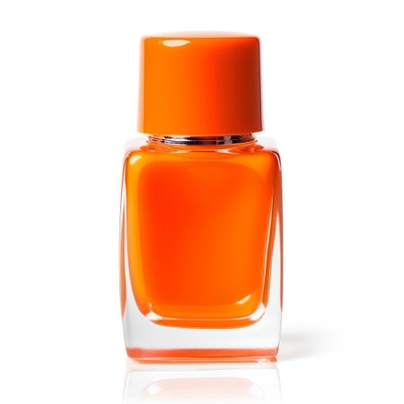 Bottle of orange nail polish isolated on white background, clipping path includedの素材