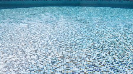 Swimming pool with mosaic tiles. Swimming pool with mosaic tiles.の素材