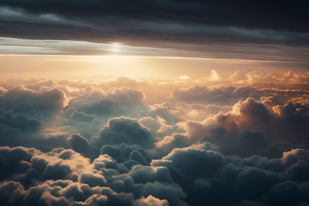 Aerial view above clouds at sunset. View from airplane window.の素材