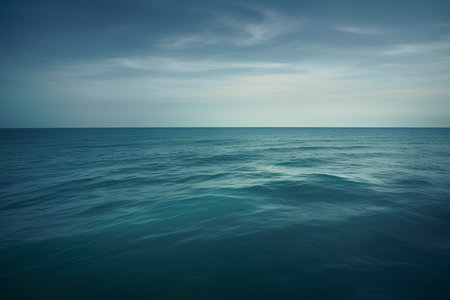 Beautiful seascape. Blue sky with clouds over calm sea.の素材