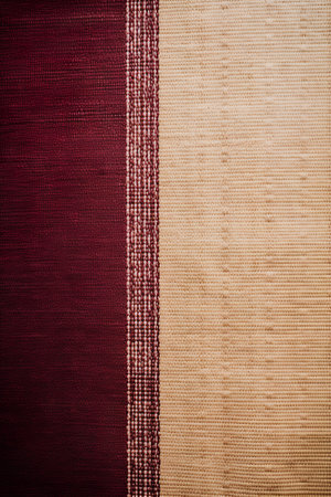 Closeup detail of brown fabric texture background with vignette.の素材