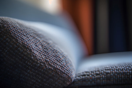 Close up of a book on a sofa. Selective focus.の素材