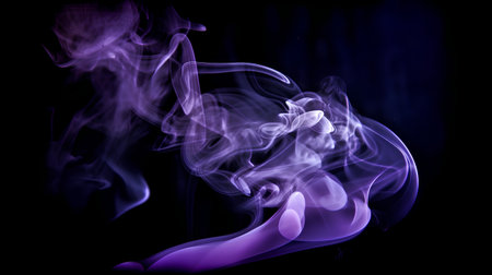 Purple smoke on a black background. Abstract background for design.の素材