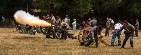 Duncan Mills, California - July 14, 2012: Civil War Confederate Canon is fired in war reenactmentのeditorial素材