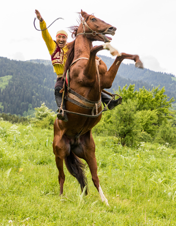 Almaty, Kazakhstan - May 31, 2017: Man rears horse inのeditorial素材