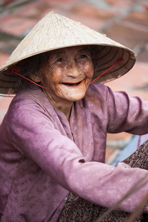 Hue, Vietnam - Oct 27, 2011:  woman says helloのeditorial素材