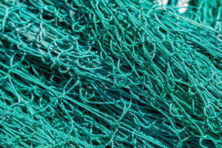 Background texture of green and white fishing net