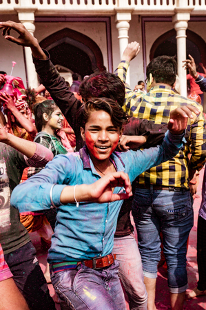 Nandgeon, India, Holi Festival, Feb 25, 2018 - Young men dance during Holi Festival in Indiaのeditorial素材