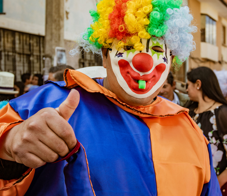 Cuenca, Ecuador, Jan 13, 2018: Clown signals Thumbs Up in paradeのeditorial素材