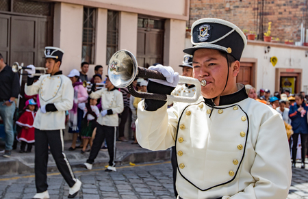 Cuenca, Ecuador, Jan 13, 2018: Bugler marching in parade in paradeのeditorial素材