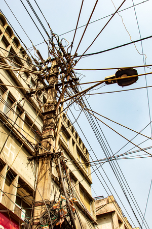 New Delhi, India, Feb 19, 2018 - Overhead cables create a rats mazeのeditorial素材