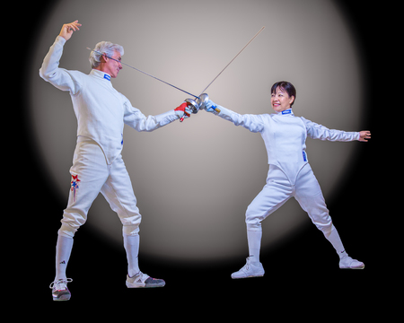Two fencers demonstrate salute stance on Mar 20, 2011のeditorial素材