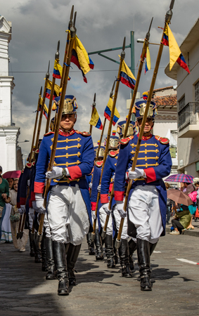 Cuenca, Ecuador Dec 24, 2017 - Military honor guard in historic uniforms march in annual Pase de Nino paradeのeditorial素材