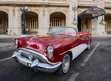 Havana, Cuba, Nov 21, 2017 - 1950's Classic American Red and white Buick convertible parked in front of Havana Opera Houseのeditorial素材