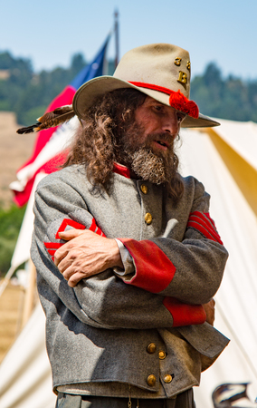 Duncan Mills, California - July 14, 2012: Man stands in Confederate uniform during Civil War Reenactmentのeditorial素材