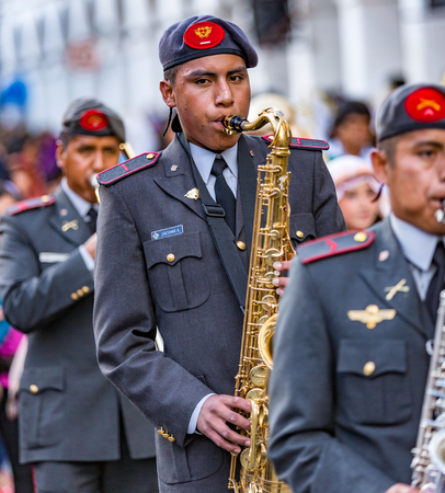 Cuenca, Equador - Dec 24, 2013: Military band plays during Paseo del Nino parade