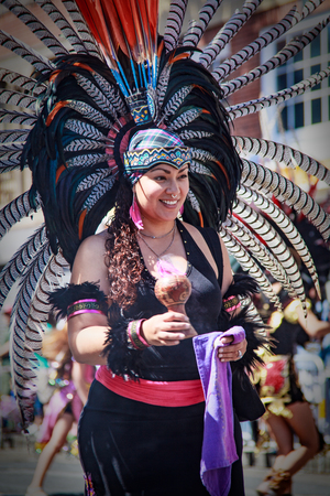 Woman in traditional Mexican feathers in San Francisco parade on May 30, 2010のeditorial素材