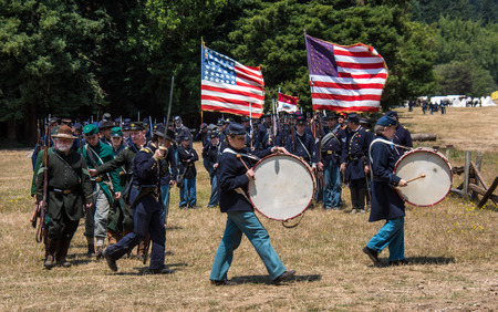 Duncan Mills, Calif / July 14, 2012: Men march in Union Army Uniforms during Civil War Reenactmentのeditorial素材
