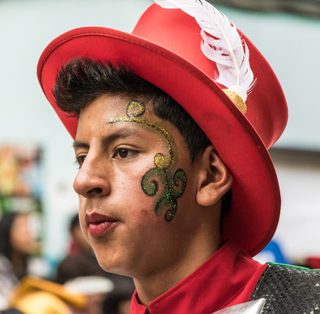 Ambato, Ecuador / Feb 15, 2015 - Man in costume dances at Carnaval paradeのeditorial素材