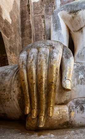 Long Fingers of Giant Buddha at Ayuthaya, Sukothai Thailandの写真素材
