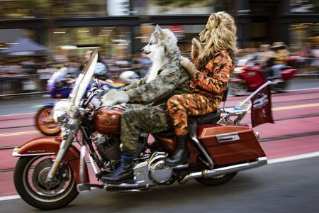 SAN FRANCISCO, CALIFORNIA, JUNE 24, 2018:  GAY PRIDE PARADE - Dykes On Bikes lead the parade past blurred audienceのeditorial素材