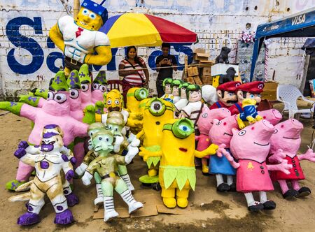 Salinas, Ecuador - December 31, 2015 - Manijotes, or paper mache manniquins are made to be burned at midnight on New Years Eve in Ecuadorのeditorial素材