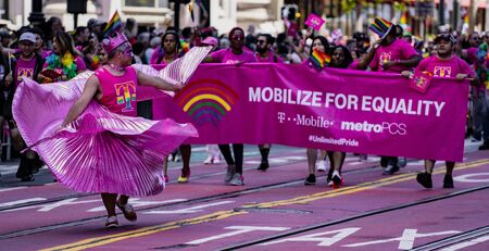 SAN FRANCISCO, CALIFORNIA, JUNE 24, 2018:  GAY PRIDE PARADE - Corporate T-Mobile cellular marches