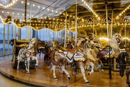 NEW YORK CITY, NEW YORK, MAR 27, 2018: Merry-Go-Round in Dumbo Park at the base of the Brooklyn Bridgeのeditorial素材