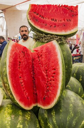 Istanbul, Turkey - May 31, 2016 - Waternelons are cut open for display of their freshness in a local fruit marketのeditorial素材