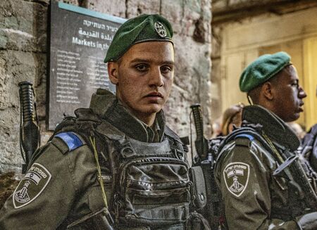 Jerusalem, Israel - 2019-04-26 - Soldiers stand guard at all public places.のeditorial素材