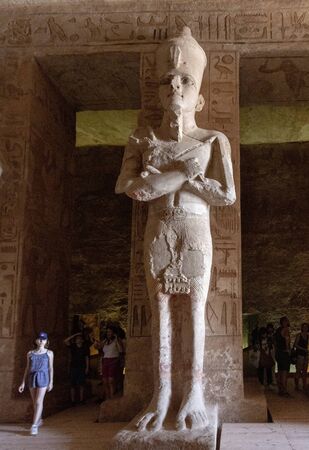 Aswan, Egypt - 2019-04-29 - Abu Simbel temple statues and hierglyphs.