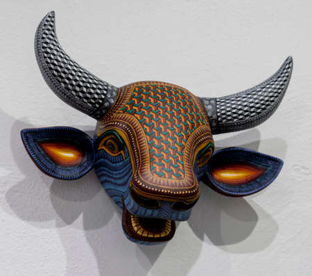 Sant Matin Ticajete, Mexico - 2019-11-26 - elaborate Alebrije wooden bulls head.のeditorial素材