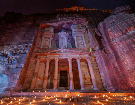 Petra, Jordan - 2019-04-22 - Treasurey at night lit by candles.のeditorial素材