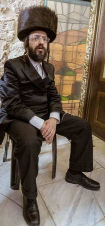 Jerusalem, Israel - 2019-04-26 - orthodox Jew sits on a chair.のeditorial素材