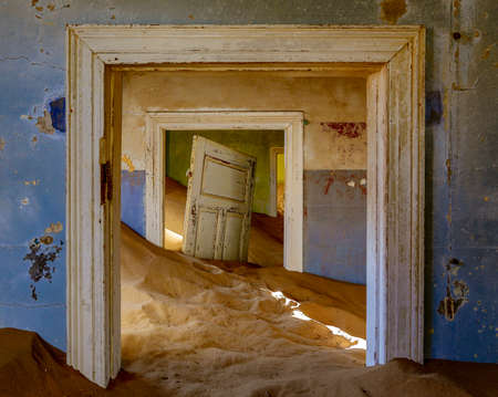 Sand has invaded and taken over these rooms in Kolmanskoppe, Namibiaの写真素材