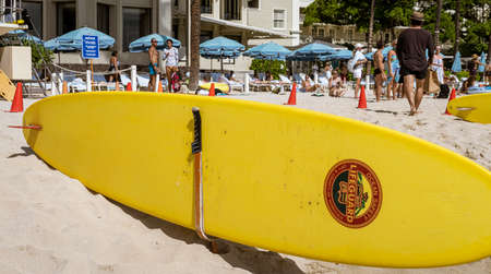 Waikiki, Honolulu, Hawaii - Oct 31, 2021-Lifeguard surfboard on the beach.のeditorial素材