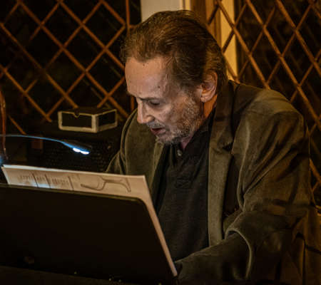 Cuenca, Ecuador, Dec 4, 2021 - Man plays Piano.のeditorial素材
