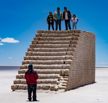 Uyuni, Bolivia, 01182023 - People standing on the Stairway to Heaven, a salt stairway in the middle of the Bolivian Salt Flats going from nowhere to nowhere.のeditorial素材