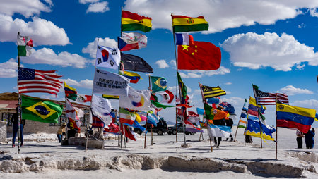 Uyuni, Bolivia, 01182023 - Visitors from the world plant their country flags at the original hotel on the Bolivian Salt Flats.のeditorial素材