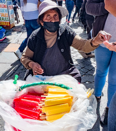 La Paz, Bolivia, 01222023 - Vendors sell food at parade to celebrate the name change of Bolivia to be inclusive of the Indigenous people.のeditorial素材