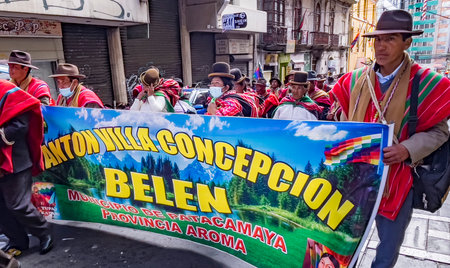 La Paz, Bolivia, 01222023 - People march in parade to celebrate the name change of Bolivia to be inclusive of the Indigenous people.のeditorial素材