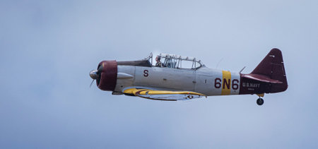 Honolulu, Hawaii, USA, 2022-08-14: Military Air Show, T-6B Texan II turboprop trainer airplane in flgiht.のeditorial素材