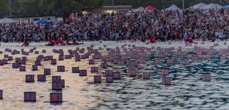 hawaii, honolulu - 20230530: Shinnyo Floating Lantern Festival - people look at the hundreds of floating lanterns.のeditorial素材